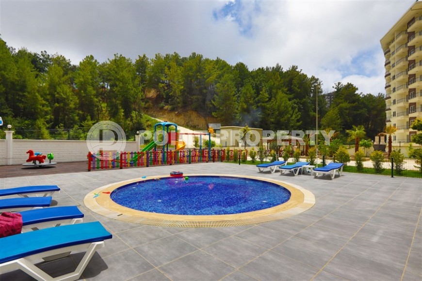 Квартира 1+1 в 1200 метрах от моря, в живописном районе Аланьи - Авсаллар-id-8078-фото-15