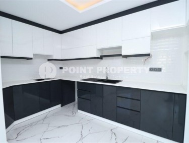 Spacious 3+1 apartment on the 5th floor in a residence at the final stage of construction in the center of Alanya-id-8080-photo-4