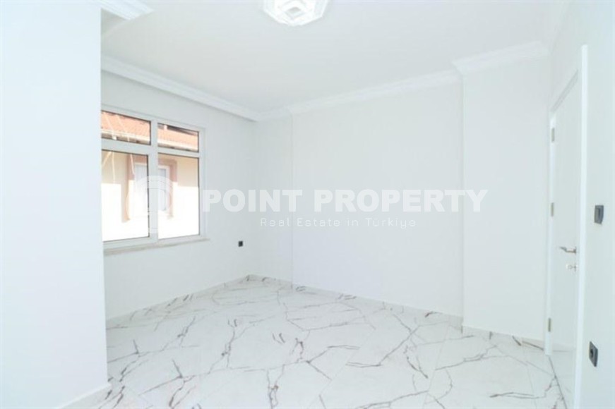 Spacious 3+1 apartment on the 5th floor in a residence at the final stage of construction in the center of Alanya-id-8080-photo-6