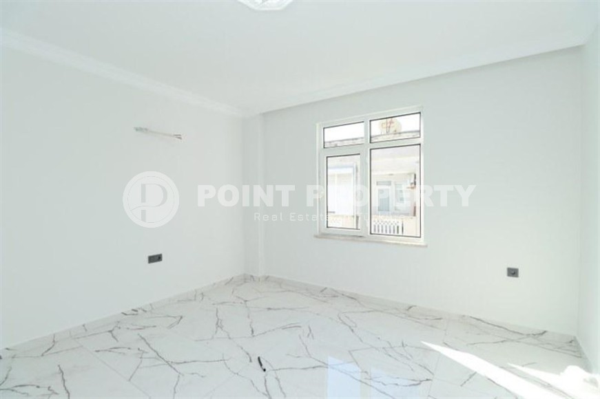 Spacious 3+1 apartment on the 5th floor in a residence at the final stage of construction in the center of Alanya-id-8080-photo-7
