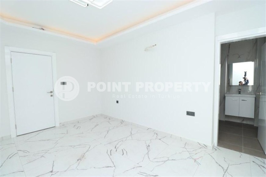 Spacious 3+1 apartment on the 5th floor in a residence at the final stage of construction in the center of Alanya-id-8080-photo-8