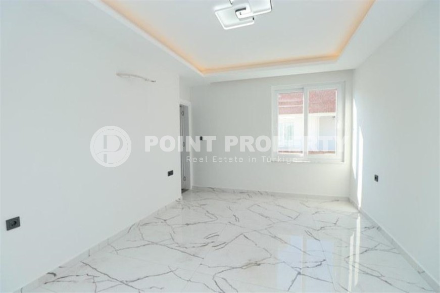 Spacious 3+1 apartment on the 5th floor in a residence at the final stage of construction in the center of Alanya-id-8080-photo-9