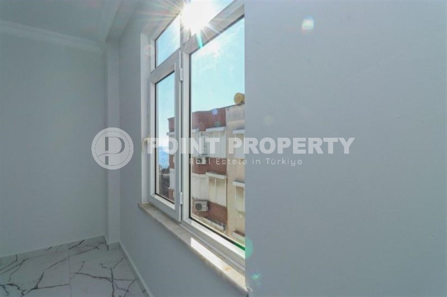 Spacious 3+1 apartment on the 5th floor in a residence at the final stage of construction in the center of Alanya-id-8080-photo-11