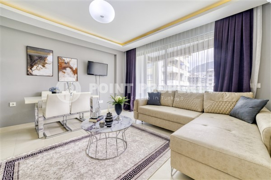 Уютная меблированная студия, 40м², в резиденции на первой береговой линии в районе Кестель, Алания.-id-1632-фото-2