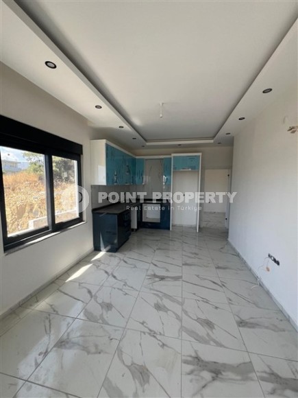 Inexpensive 1+1 apartment one and a half kilometers from the sea, in a quiet area of Alanya - Demirtas-id-8081-photo-2