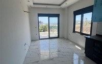 Inexpensive 1+1 apartment one and a half kilometers from the sea, in a quiet area of Alanya - Demirtas-id-8081-photo-3