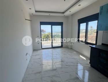 Недорогая квартира 1+1 в полутора километрах от моря, в спокойном районе Аланьи - Демирташ-id-8081-фото-3