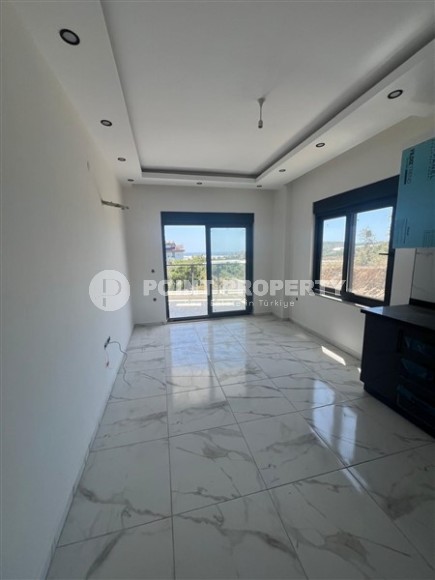 Inexpensive 1+1 apartment one and a half kilometers from the sea, in a quiet area of Alanya - Demirtas-id-8081-photo-3