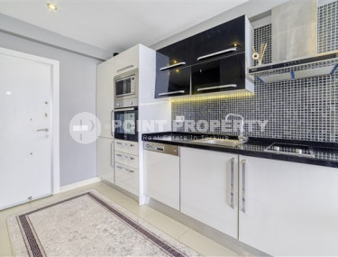 Уютная меблированная студия, 40м², в резиденции на первой береговой линии в районе Кестель, Алания.-id-1632-фото-3