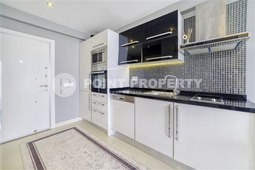 Уютная меблированная студия, 40м², в резиденции на первой береговой линии в районе Кестель, Алания.-id-1632-фото-3