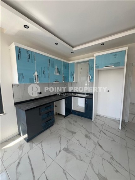 Inexpensive 1+1 apartment one and a half kilometers from the sea, in a quiet area of Alanya - Demirtas-id-8081-photo-4