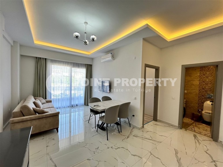 Ready-to-move-in apartment 1+1, with a total area of 55 m2, on the 4th floor in a new residential complex, commissioned in 2023-id-8082-photo-2