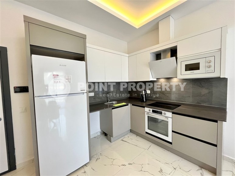 Ready-to-move-in apartment 1+1, with a total area of 55 m2, on the 4th floor in a new residential complex, commissioned in 2023-id-8082-photo-4