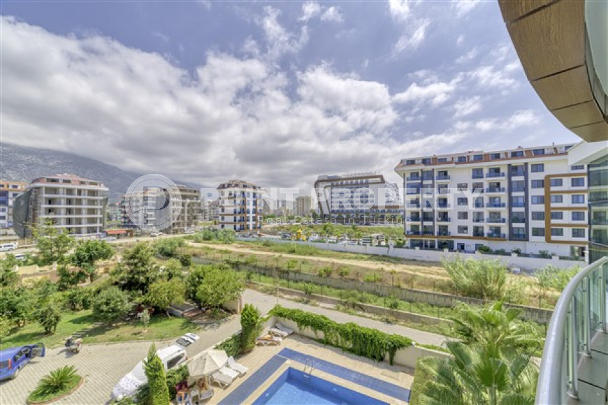 Уютная меблированная студия, 40м², в резиденции на первой береговой линии в районе Кестель, Алания.-id-1632-фото-7