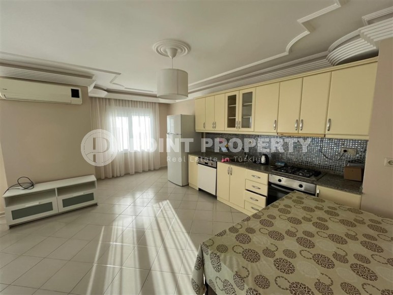 Просторная двухуровневая квартира на 11-м этаже с мансардой, в центре района Махмутлар-id-8087-фото-4