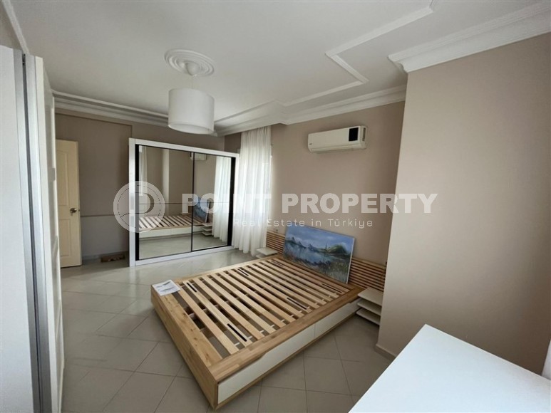 Просторная двухуровневая квартира на 11-м этаже с мансардой, в центре района Махмутлар-id-8087-фото-9