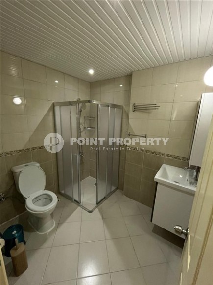 Просторная двухуровневая квартира на 11-м этаже с мансардой, в центре района Махмутлар-id-8087-фото-13