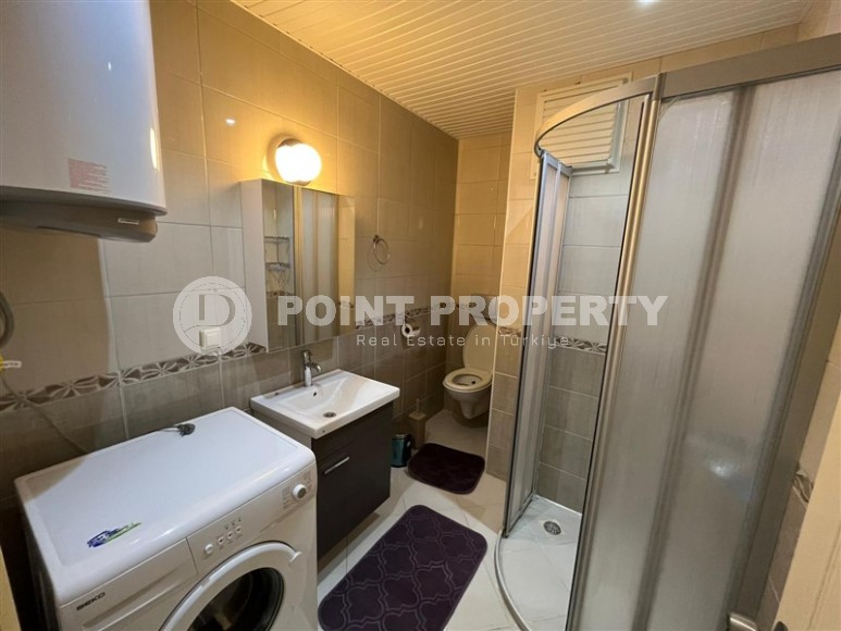 Просторная двухуровневая квартира на 11-м этаже с мансардой, в центре района Махмутлар-id-8087-фото-14