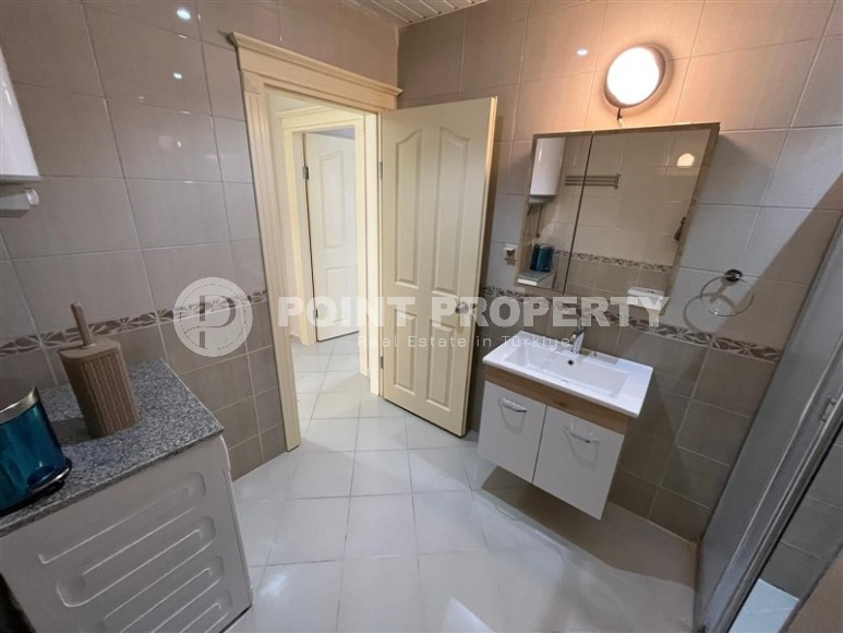 Просторная двухуровневая квартира на 11-м этаже с мансардой, в центре района Махмутлар-id-8087-фото-15