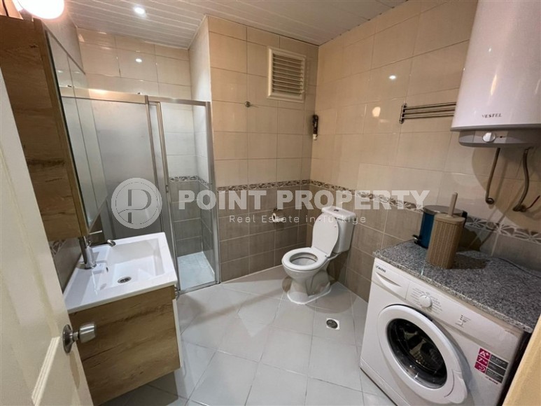 Просторная двухуровневая квартира на 11-м этаже с мансардой, в центре района Махмутлар-id-8087-фото-16