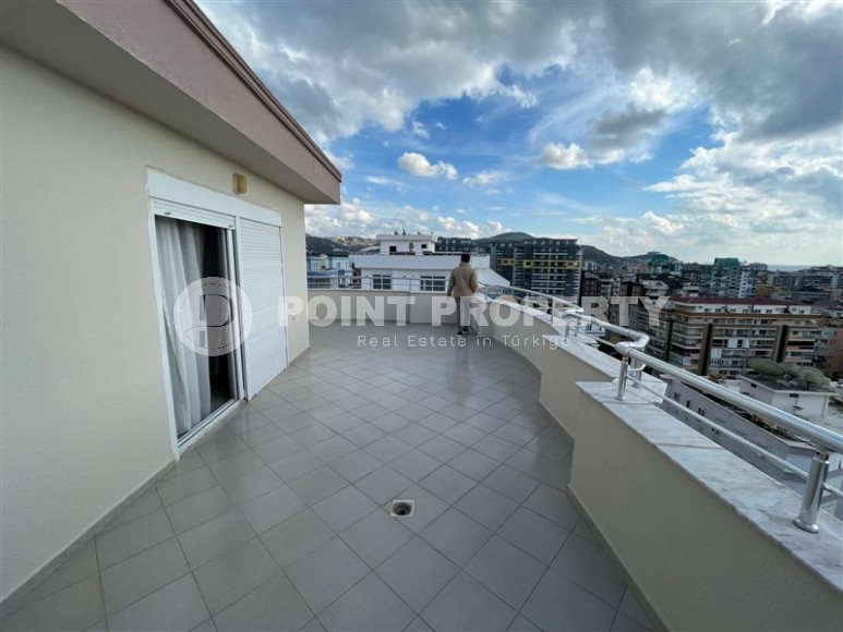 Просторная двухуровневая квартира на 11-м этаже с мансардой, в центре района Махмутлар-id-8087-фото-17