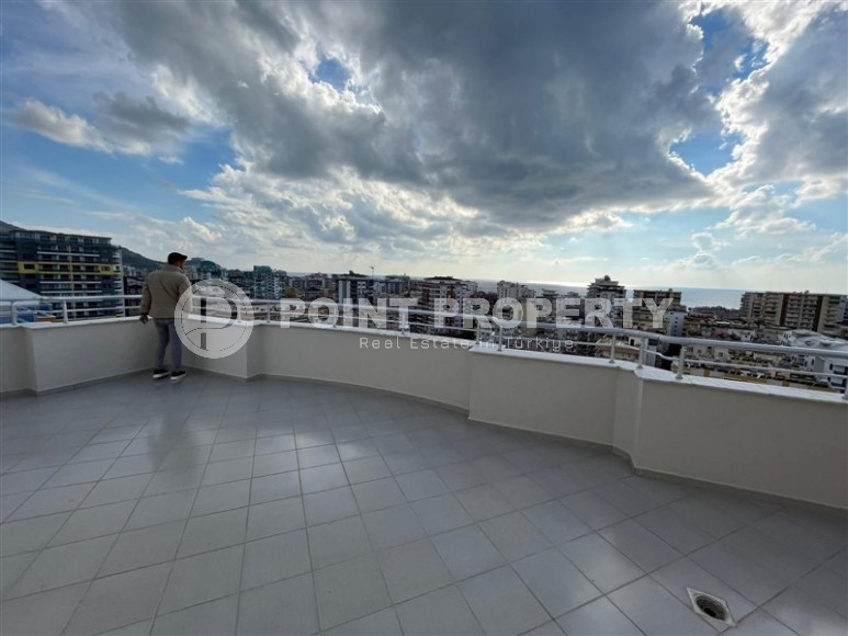 Просторная двухуровневая квартира на 11-м этаже с мансардой, в центре района Махмутлар-id-8087-фото-18