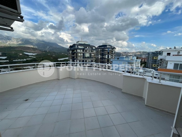 Просторная двухуровневая квартира на 11-м этаже с мансардой, в центре района Махмутлар-id-8087-фото-19