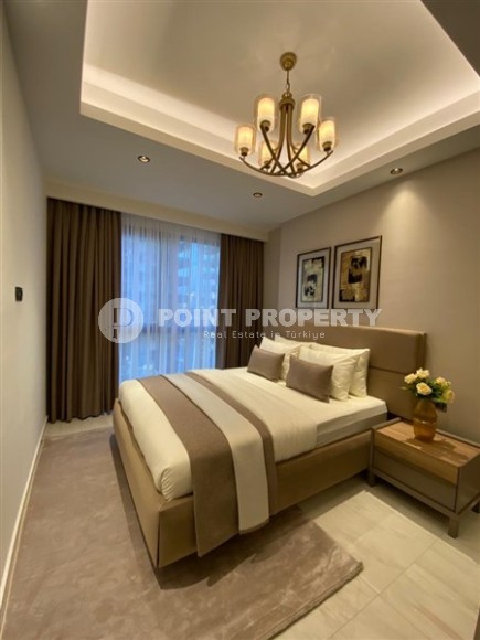 Современная квартира 3+1 на берегу Средиземного моря, в элитном жилом комплексе, введенном в эксплуатацию в 2023 году-id-8090-фото-6