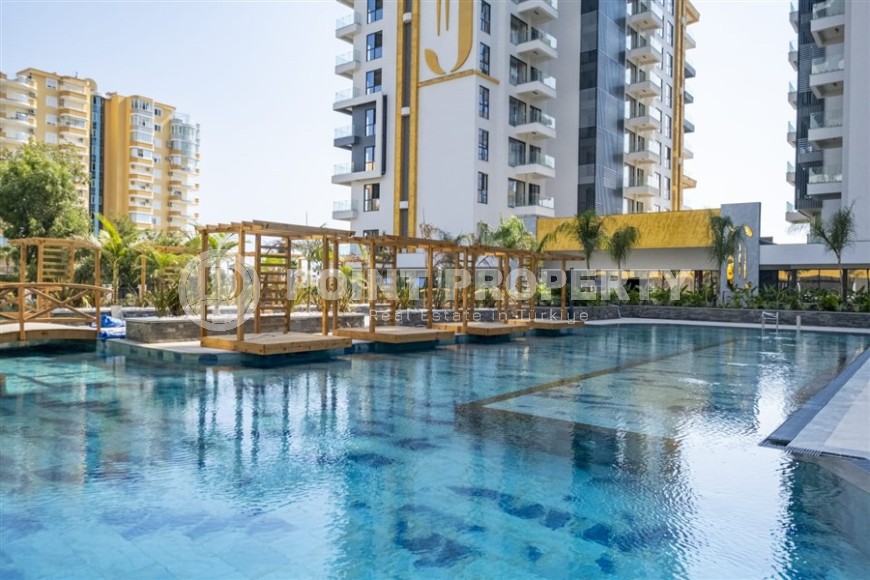 Современная квартира 3+1 на берегу Средиземного моря, в элитном жилом комплексе, введенном в эксплуатацию в 2023 году-id-8090-фото-16