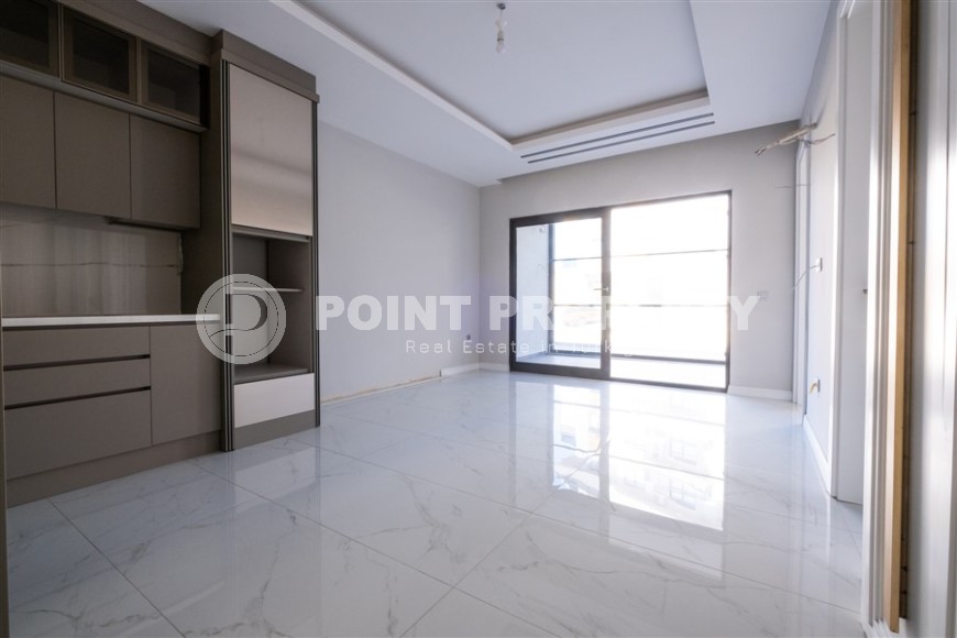 Small apartment 1+1, with a total area of 50 m2, on the 1st floor in a new residential complex, commissioned in 2024-id-8100-photo-2