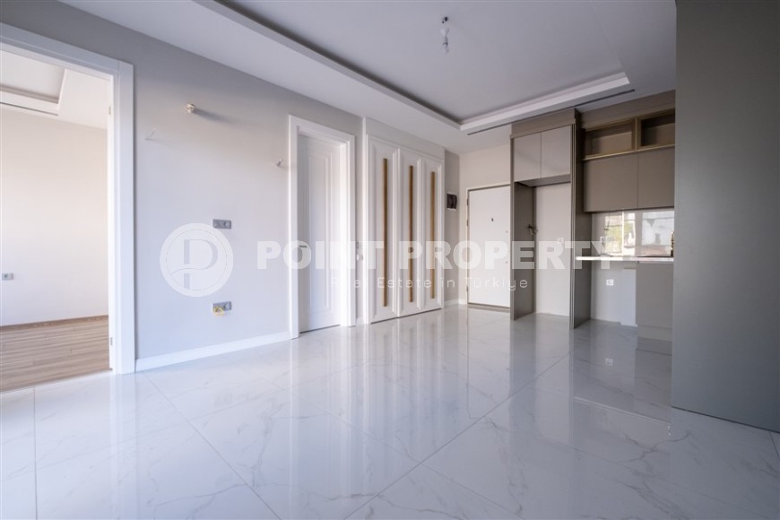 Small apartment 1+1, with a total area of 50 m2, on the 1st floor in a new residential complex, commissioned in 2024-id-8100-photo-3