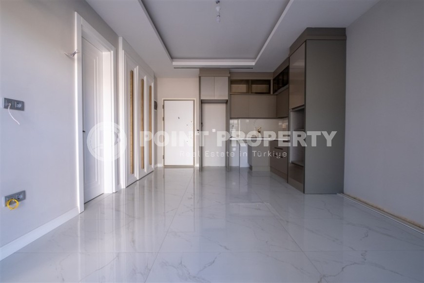 Small apartment 1+1, with a total area of 50 m2, on the 1st floor in a new residential complex, commissioned in 2024-id-8100-photo-4