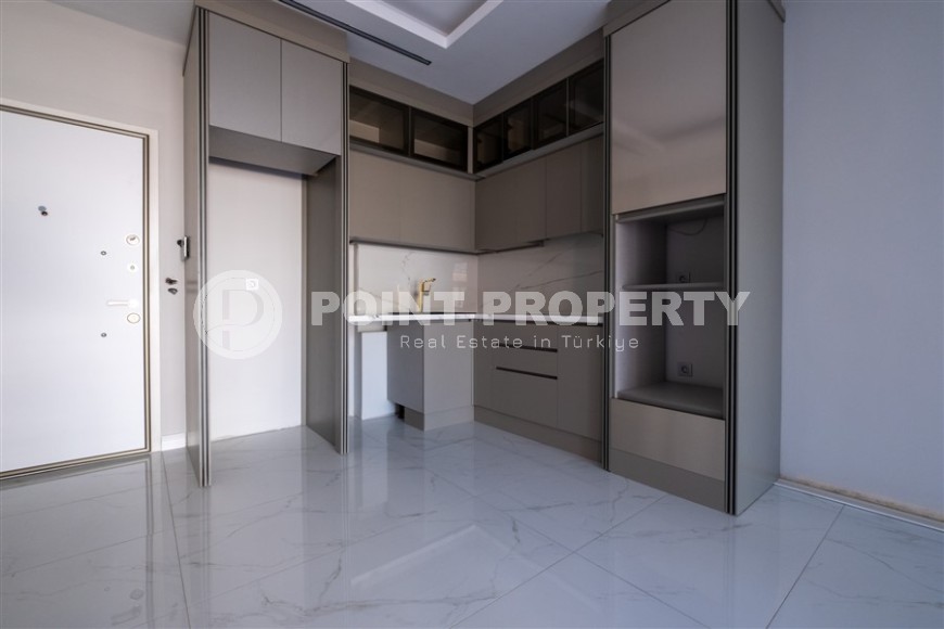 Small apartment 1+1, with a total area of 50 m2, on the 1st floor in a new residential complex, commissioned in 2024-id-8100-photo-5