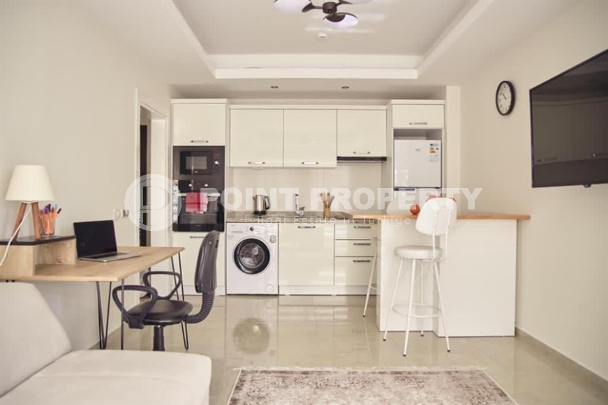 Современная квартира 1+1 в 500 метрах от моря, в центре района Махмутлар-id-8121-фото-3