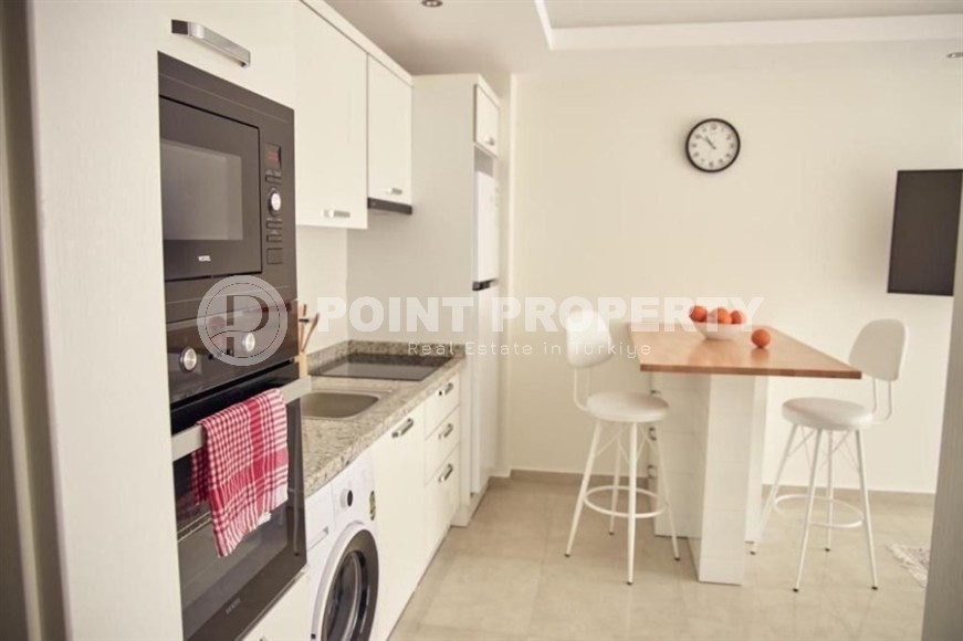 Современная квартира 1+1 в 500 метрах от моря, в центре района Махмутлар-id-8121-фото-4