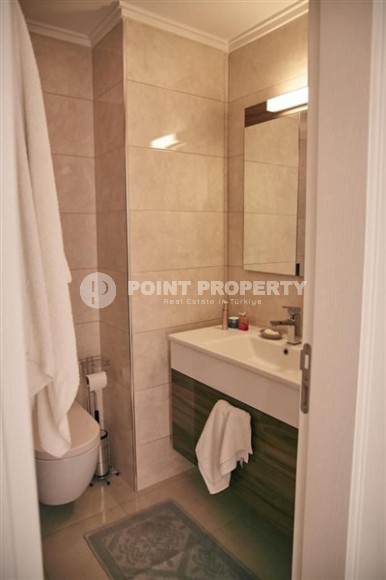 Современная квартира 1+1 в 500 метрах от моря, в центре района Махмутлар-id-8121-фото-7