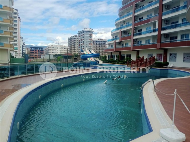 Современная квартира 1+1 в 500 метрах от моря, в центре района Махмутлар-id-8121-фото-17