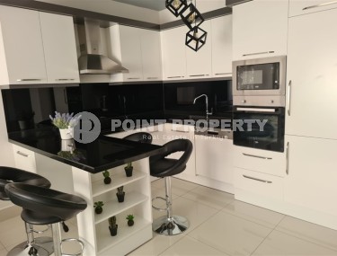 Стильная квартира на 6-м этаже в жилом комплексе 2016 года постройки, в центре района Тосмур-id-8124-фото-4