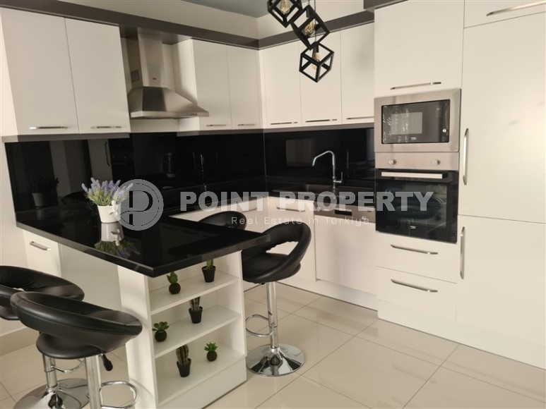 Стильная квартира на 6-м этаже в жилом комплексе 2016 года постройки, в центре района Тосмур-id-8124-фото-4