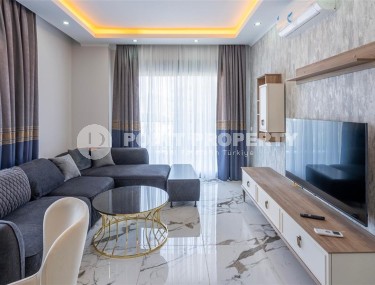 New apartment with modern design 750 meters from the sea, in the center of Mahmutlar-id-8125-photo-1