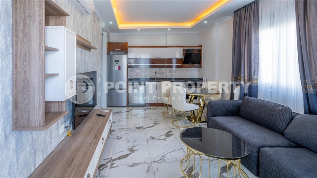 New apartment with modern design 750 meters from the sea, in the center of Mahmutlar-id-8125-photo-2