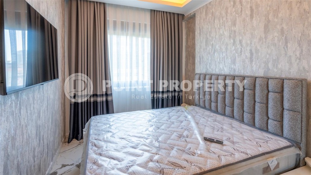 New apartment with modern design 750 meters from the sea, in the center of Mahmutlar-id-8125-photo-3