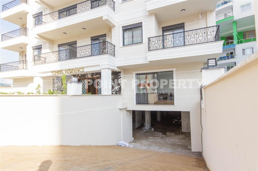 New apartment with modern design 750 meters from the sea, in the center of Mahmutlar-id-8125-photo-16