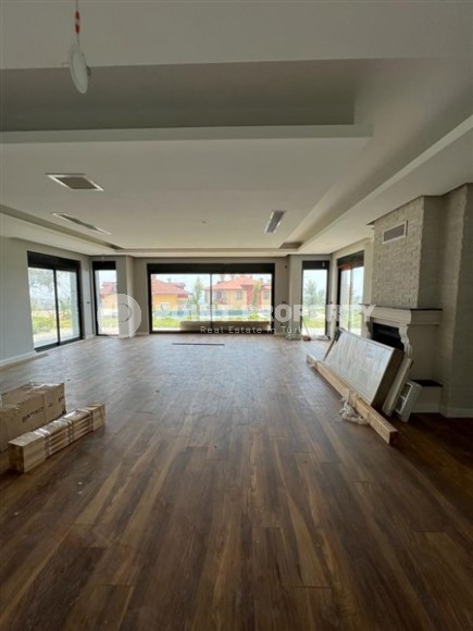 Продается отдельно стоящая вилла с лифтом и бассейном в престижном районе Бекташ, Алания.-id-8126-фото-2