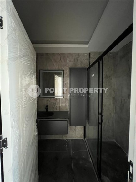 Продается отдельно стоящая вилла с лифтом и бассейном в престижном районе Бекташ, Алания.-id-8126-фото-17