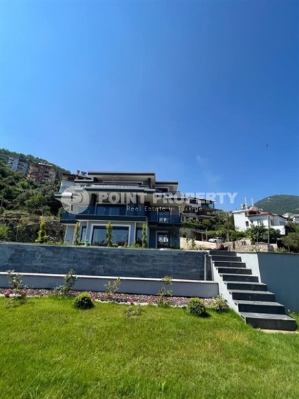 Продается отдельно стоящая вилла с лифтом и бассейном в престижном районе Бекташ, Алания.-id-8126-фото-21
