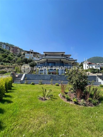 Продается отдельно стоящая вилла с лифтом и бассейном в престижном районе Бекташ, Алания.-id-8126-фото-24