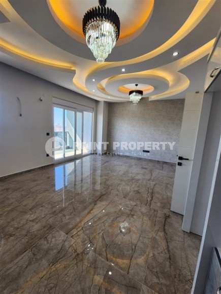 Просторная двухуровневая квартира 2+1, общей площадью 150 м2, в центре района Махмутлар-id-8134-фото-2