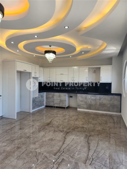 Просторная двухуровневая квартира 2+1, общей площадью 150 м2, в центре района Махмутлар-id-8134-фото-3