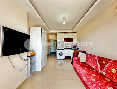 Compact studio with a total area of 30 m2, on the 10th floor in a residential complex built in 2014-id-8136-photo-1